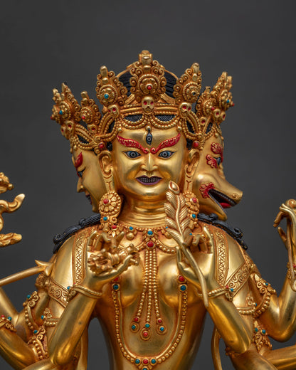 Close-up of Marichi statue Kyoto, three wrathful heads, gold fire-gilded Nepalese sculpture