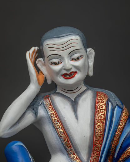 Close up of Milarepa statue holding a skull cup, handcrafted in Nepal from copper