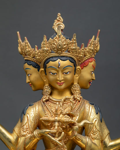 Close-up of Namgyalma statue’s three faces, ornate crown and hand-carved gold details