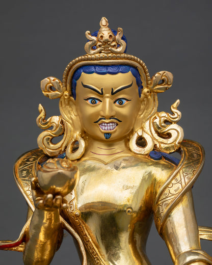 close up of naropa buddhist statue showing intricate copper carvings and sacred details