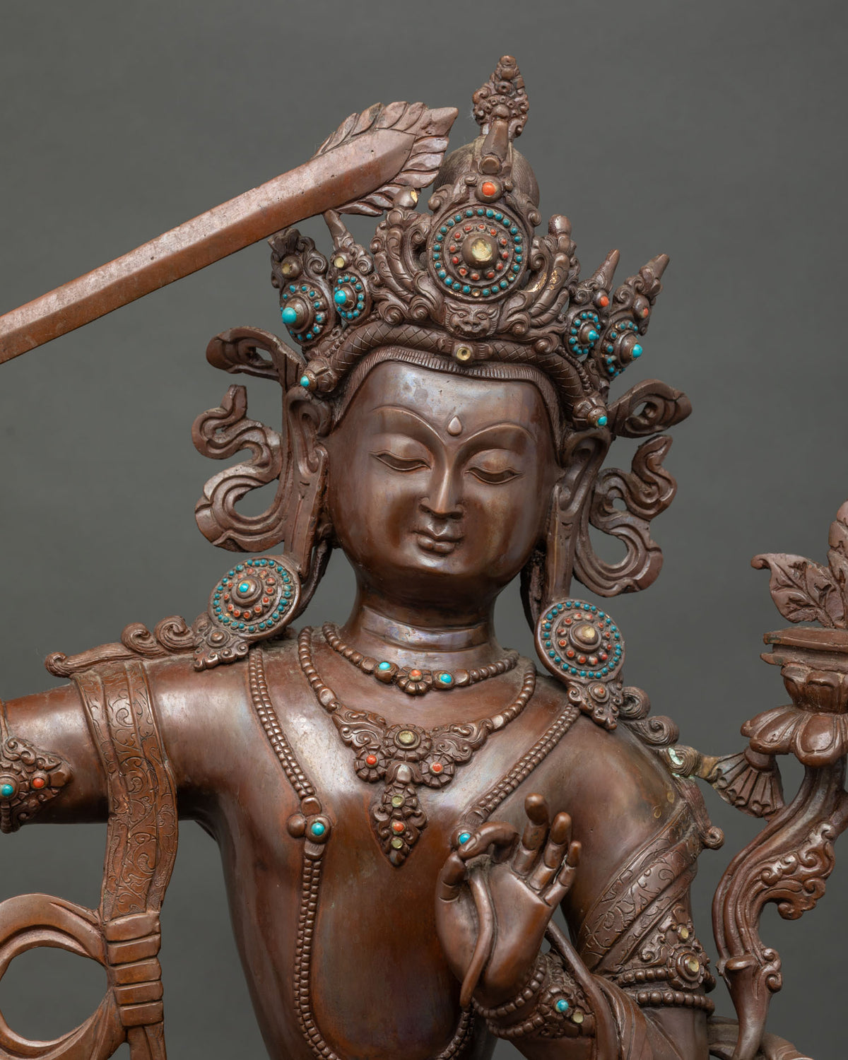 Close-up of Oxidized Copper Manjushri Statue – Handcrafted Wisdom Bodhisattva Detail