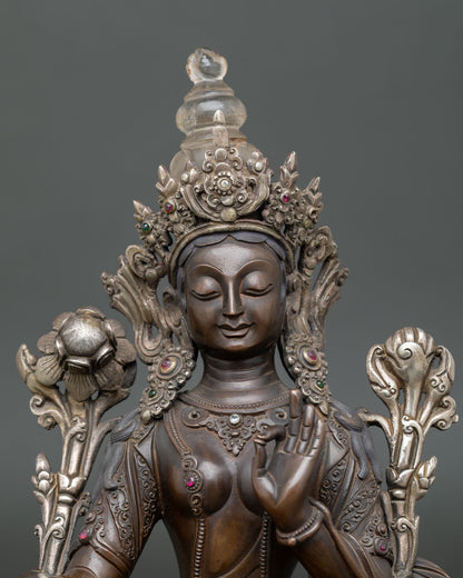 Close up of oxidized Green Tara Statue with handcrafted Nepalese Buddhist details