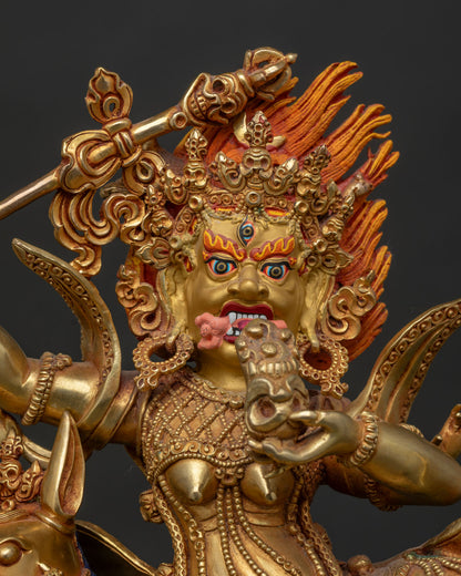 Close up of Palden Lhamo seated on her mule with intricate gold details.