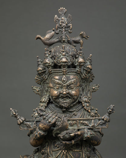 Close-up of Sakya Mahakala statue with detailed antique copper craftsmanship