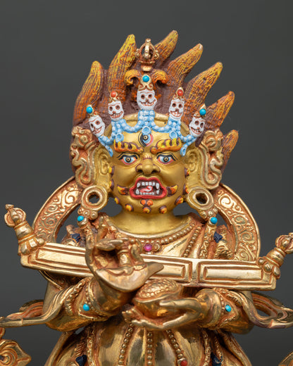 Close Up of Sakya Mahakala Statue with Gold Painted Face Five Skull Crown and Hand Painted Details