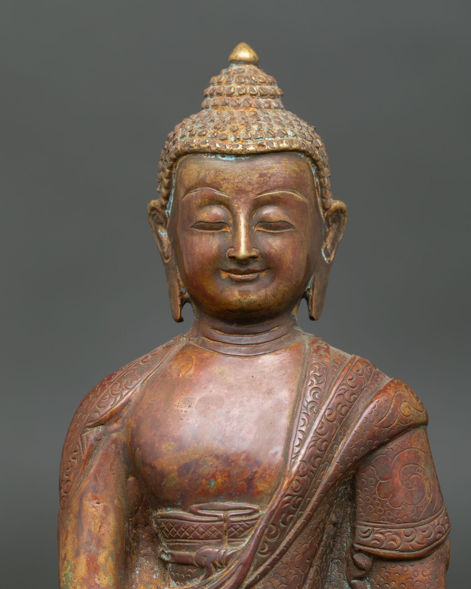 Close Up of Shakyamuni Buddha Face with Oxidized Antique Finish by Newari Artisans.