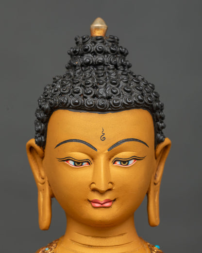 Close-up of Shakyamuni Buddha face with serene half-lidded eyes and hand-painted details