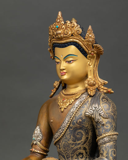 Close up of Shakyamuni Buddha gold-painted face with serene expression