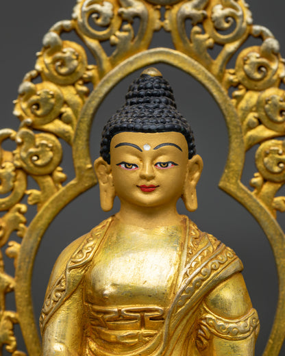 Close up of Shakyamuni Buddha showing bhumisparsha mudra and begging bowl.
