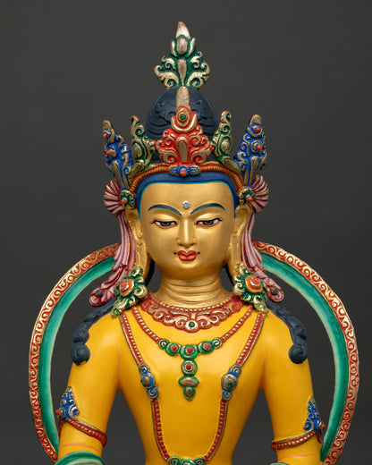 Close up of Shakyamuni Buddha statue showing serene expression gold leaf face and intricate crown details