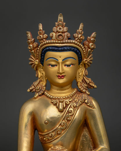 Close Up of Shakyamuni Buddha Statue with Gold Painted Face and Repoussé Details