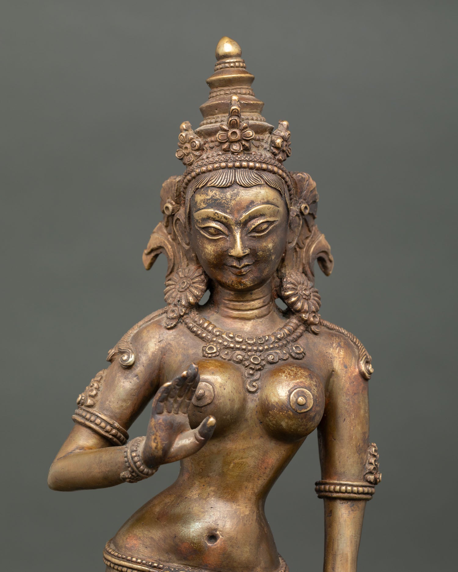 Close Up of Standing Green Tara Face with Antique Oxidized Finish.