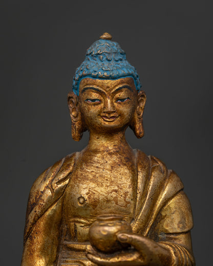 Close Up of Standing Shakyamuni Buddha Face with Hand Carved Monk Robe.