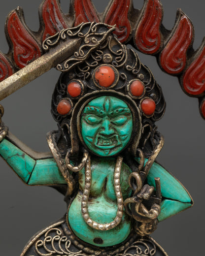 close up of turquoise sankata wrathful face and gemstone crown buddhist art from nepal