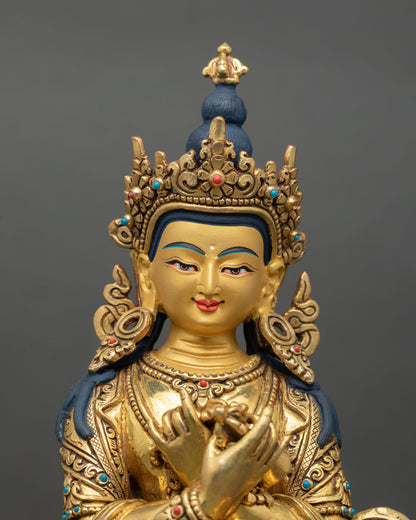 Close up of Vajradhara face with gold painted detailing and intricate Himalayan craftsmanship, Tibetan Buddhist art