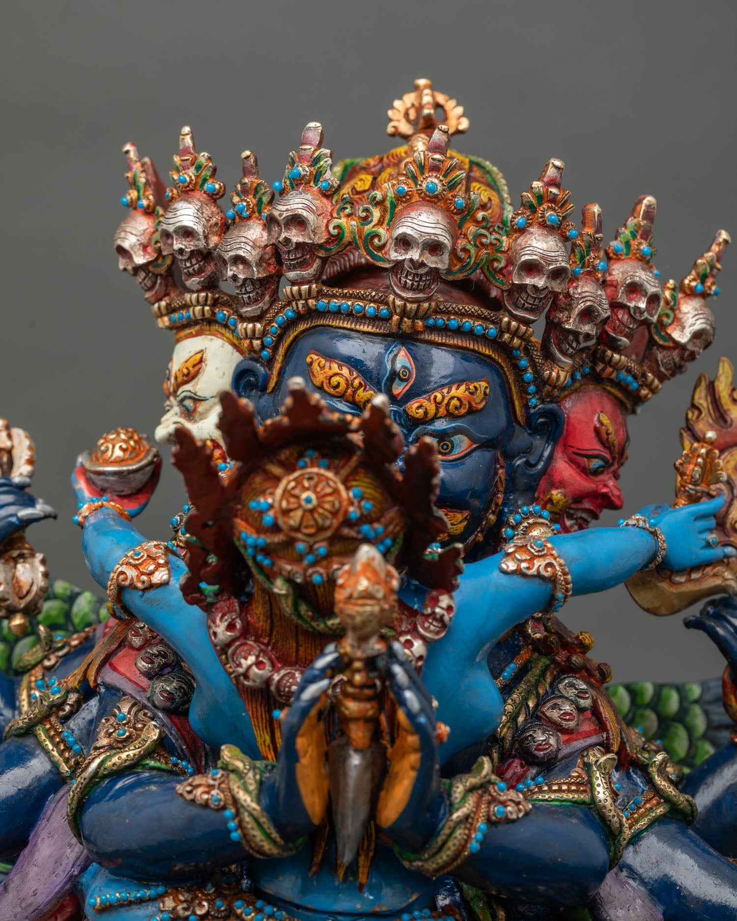 Close Up of Vajrakilaya Three Headed Statue with Semi Precious Stones