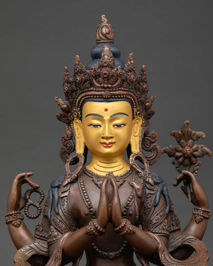 Close up of Vajrasattva Buddha statue showing peaceful expression and intricate Himalayan details.