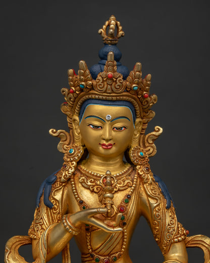 Close Up of Vajrasattva Gold Painted Face and Five Jewel Crown.