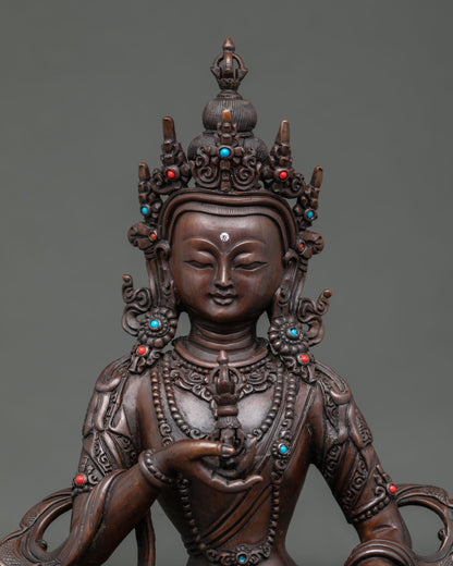 Close Up of Vajrasattva Holding Five Pronged Vajra and Sacred Bell with Semi Precious Stones.
