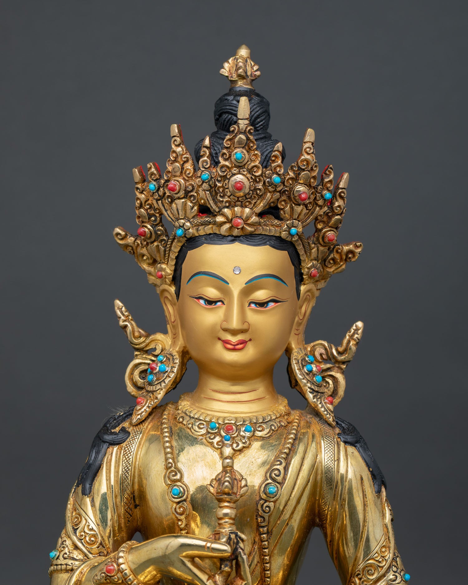Close-up of Vajrasattva Statue with gold gilding and semi-precious stone inlay