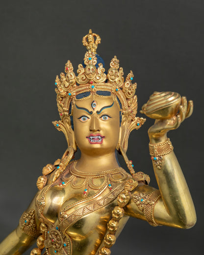 Close-up of Vajrayogini statue five-skull crown, third eye and gold face, Nepal