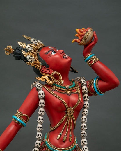 Close-up of Vajrayogini statue showing skull garland and khatvanga staff detail