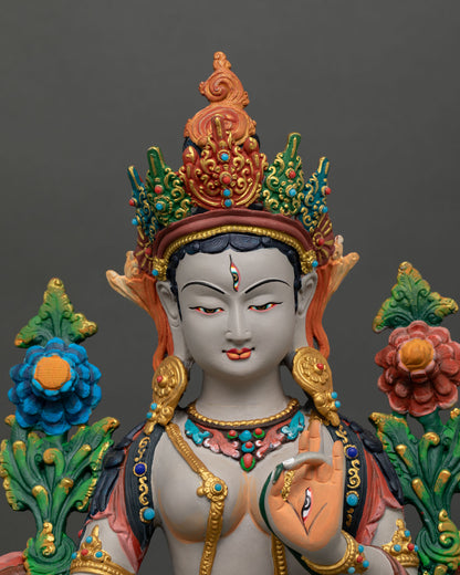 Close-up of White Tara face with seven eyes, gold-accent crown, and hand-painted Himalayan Buddhist sculpture details