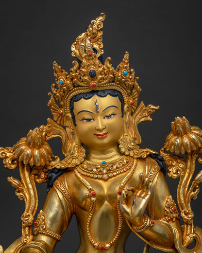 Close-up of White Tara Statue showing intricate gold fire-gilded detailing and crown