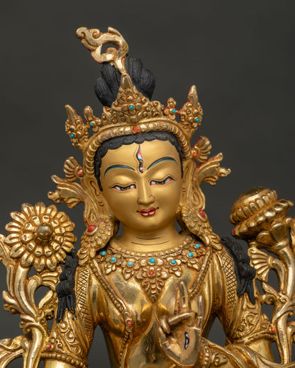 Close-Up of White Tara Statue with Gold-Painted Face and Seven Eyes