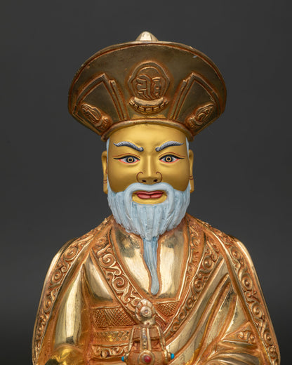 Close Up of Zhabdrung Ngawang Namgyal Gold Painted Face and Lama Hat.