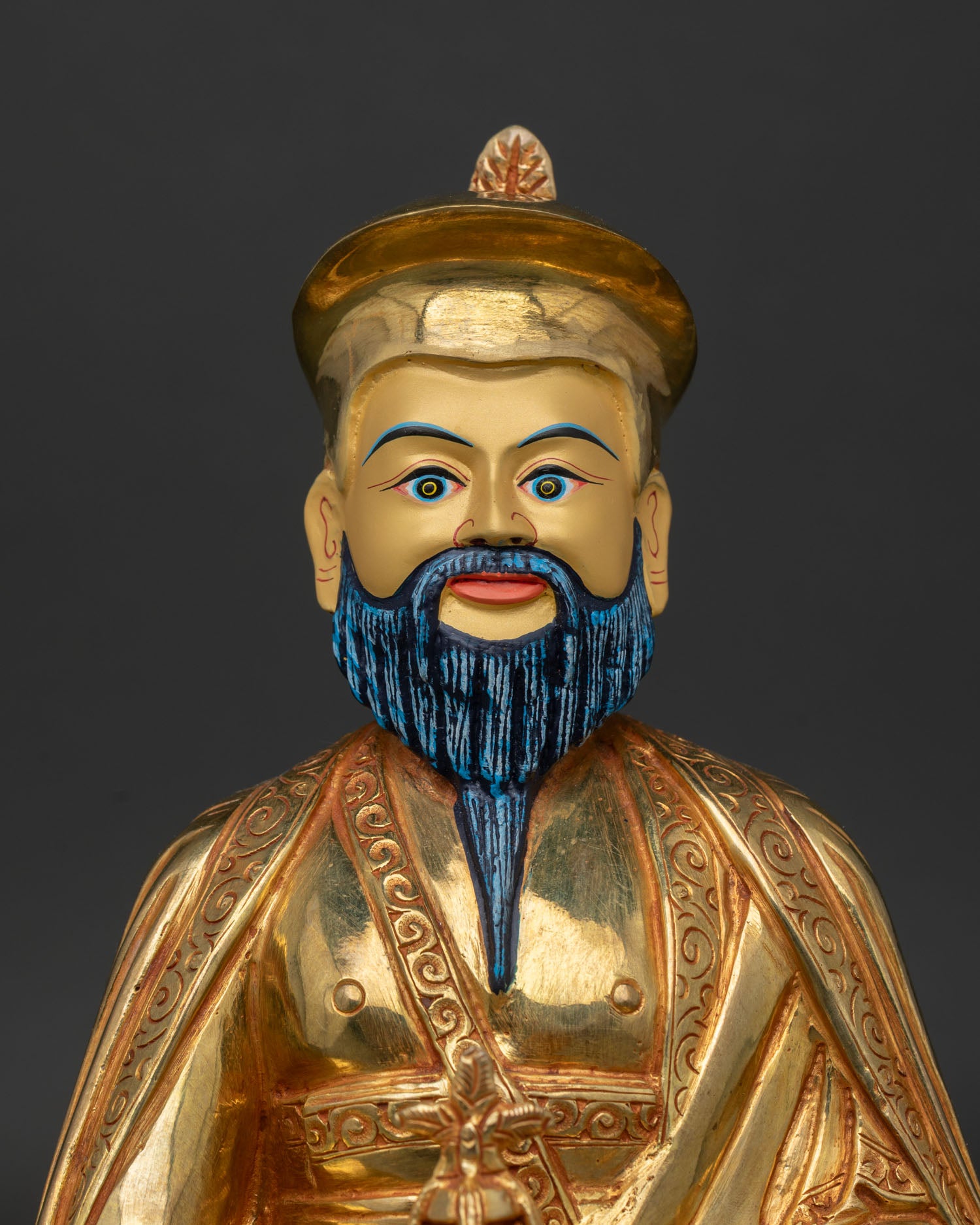 Close-up of Zhabdrung Ngawang Namgyal Statue with gold-painted face