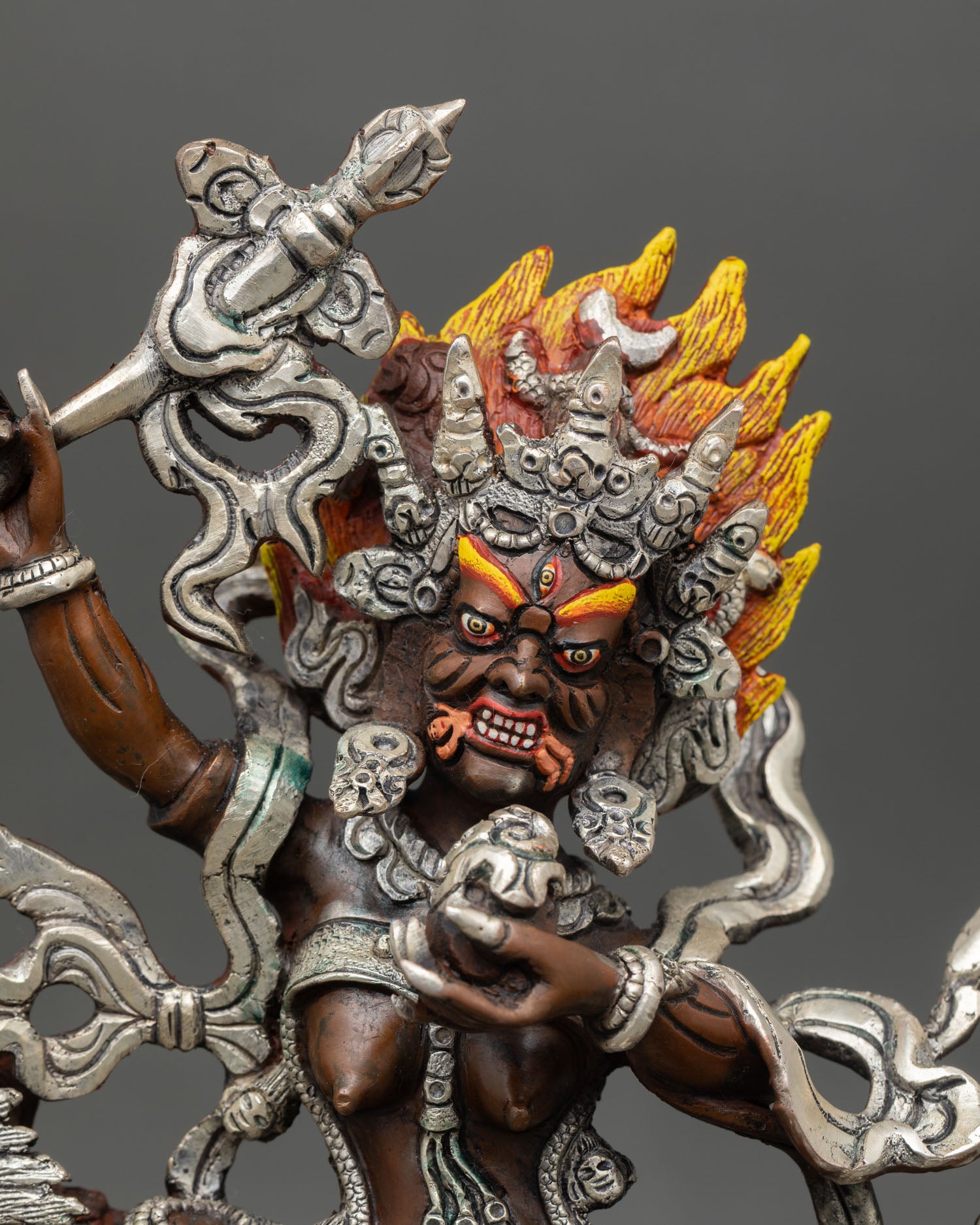 Close up Palden Lhamo Sculpture holding khatvanga skull cup Himalayan Buddhist art