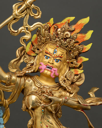 Close up Palden Lhamo statue showing intricate gold details, flaming aureole and fine Nepalese craftsmanship