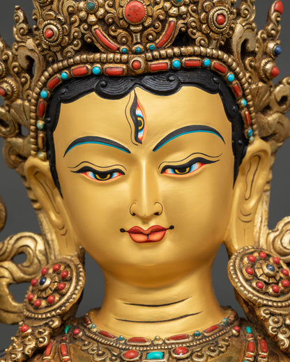 Close-up portrait of White Tara face showing serene expression and compassionate gaze