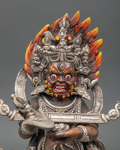 Close up of Sakya Mahakala face five skull crown serpent ornaments Nepal sculpture