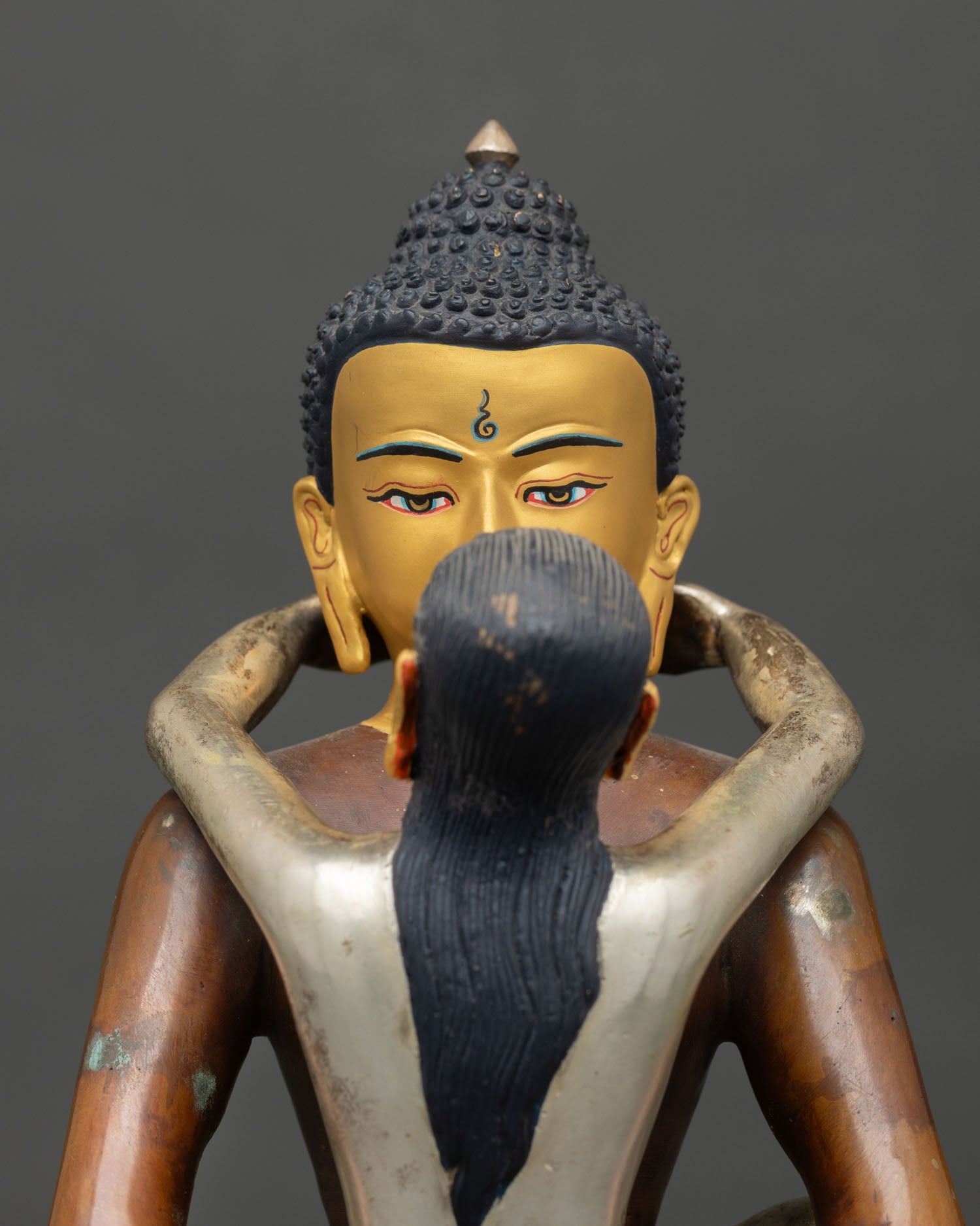 Close up Samantabhadra union with consort, gold painted face, silver plated details Nepal statue