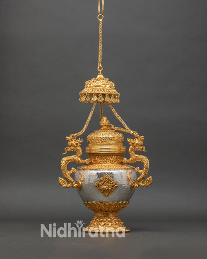 Close up Sangbur incense burner perforated lid and auspicious parasol details