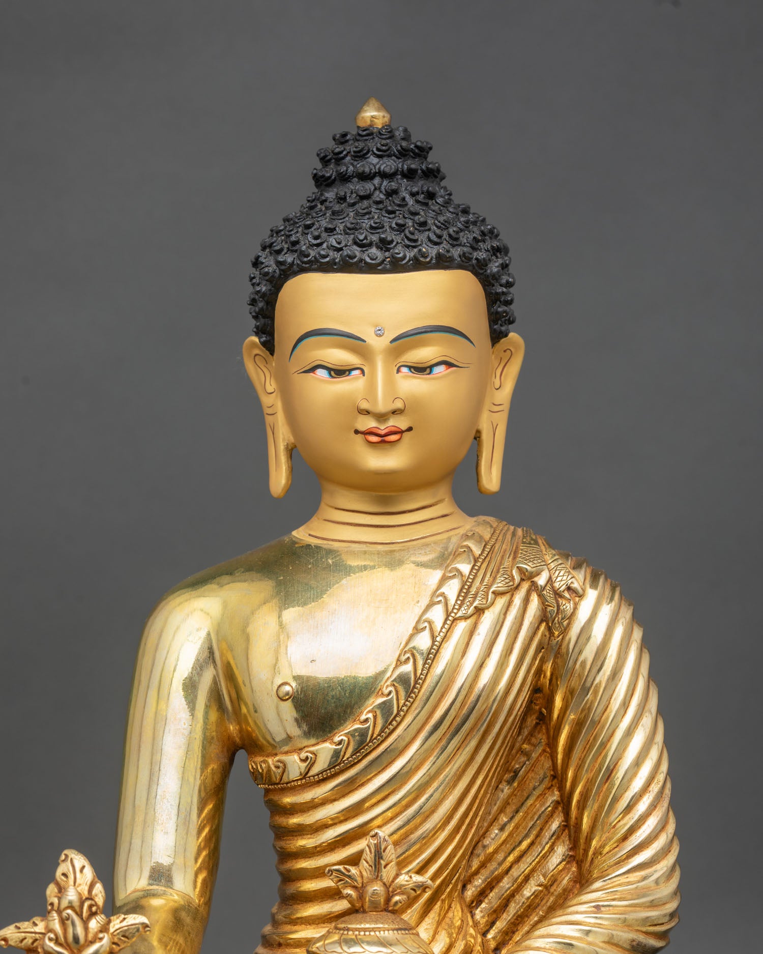 Close up Sangya Menla Medicine Buddha halo robes detail