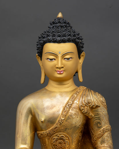 Close-up of Shakyamuni Buddha face, gold-painted, handcrafted Nepal