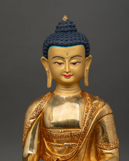 Close up Shakyamuni Buddha face gold-painted serene expression handcrafted Nepal
