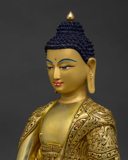 Close-up side view showing fine repoussé details on Buddha's decorated monastic robe