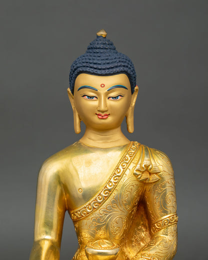 Close up Tathagata Shakyamuni Buddha gold painted face 