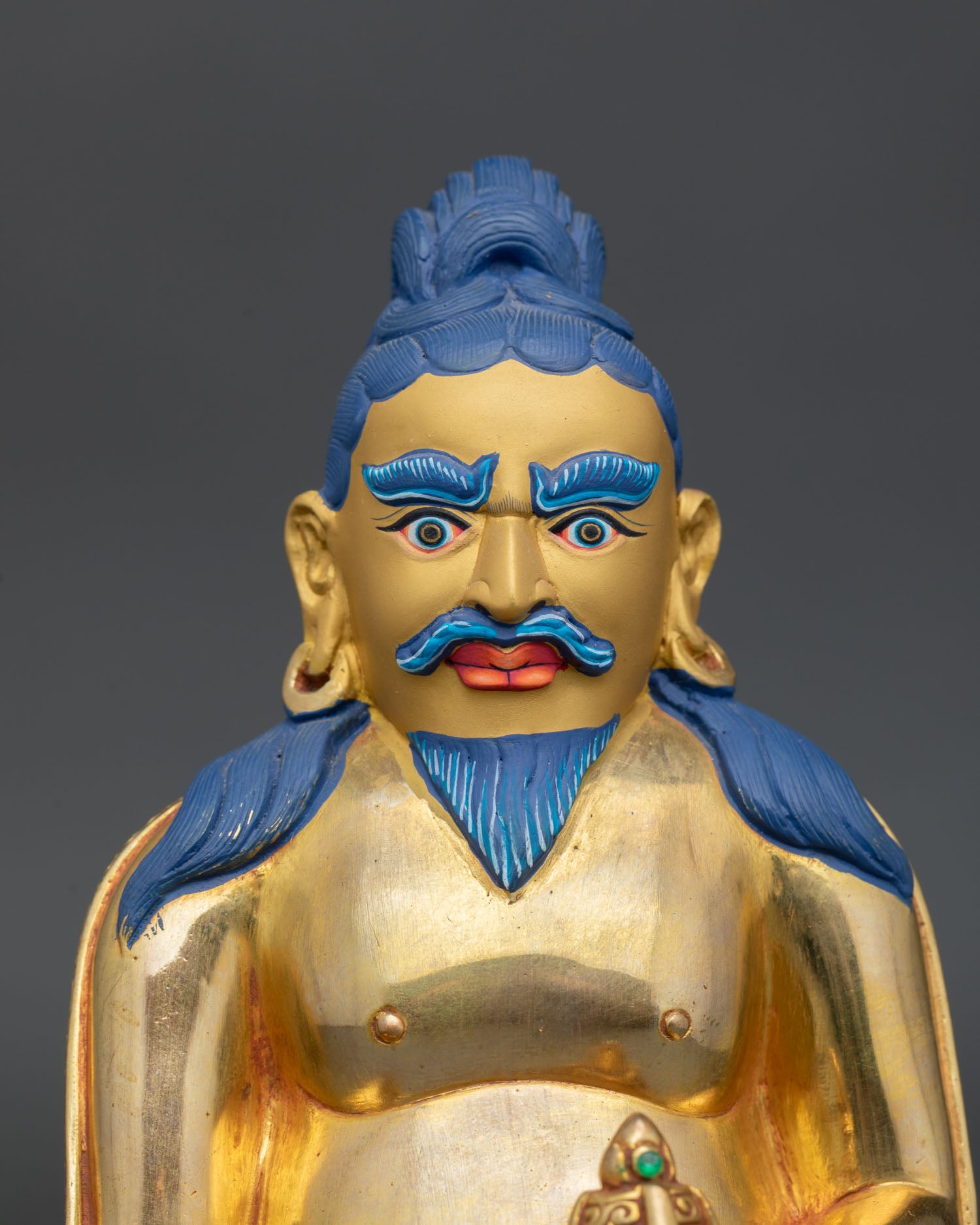 Close up Thangtong Gyalpo sculpture detail gold painted face long beard flowing hair, Newari artisan Himalayan Buddhist statue