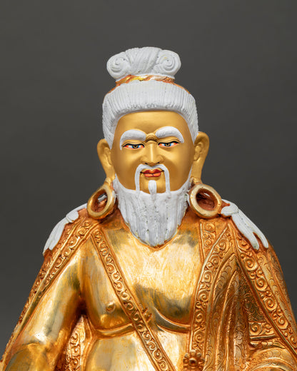 Close up Thangtong Gyalpo statue, copper gold gilded Nepal art