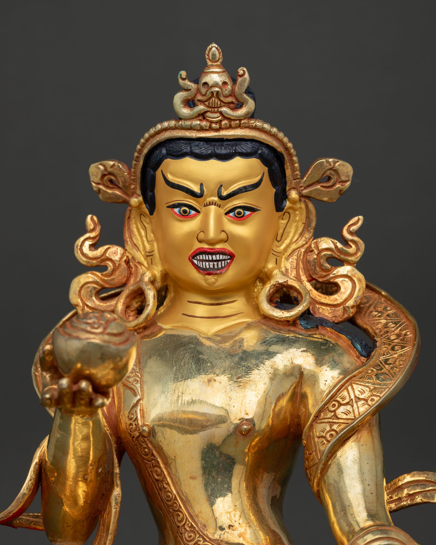 tilopa statue close up handcrafted copper fire gilded detail buddhist art nepal