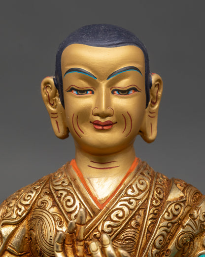 Close up Tsongkhapa face serene expression jeweled crown meditation altar decor