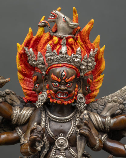 Close up Vajrakilaya face hand-painted details Newari artisan wrathful deity spiritual sculpture