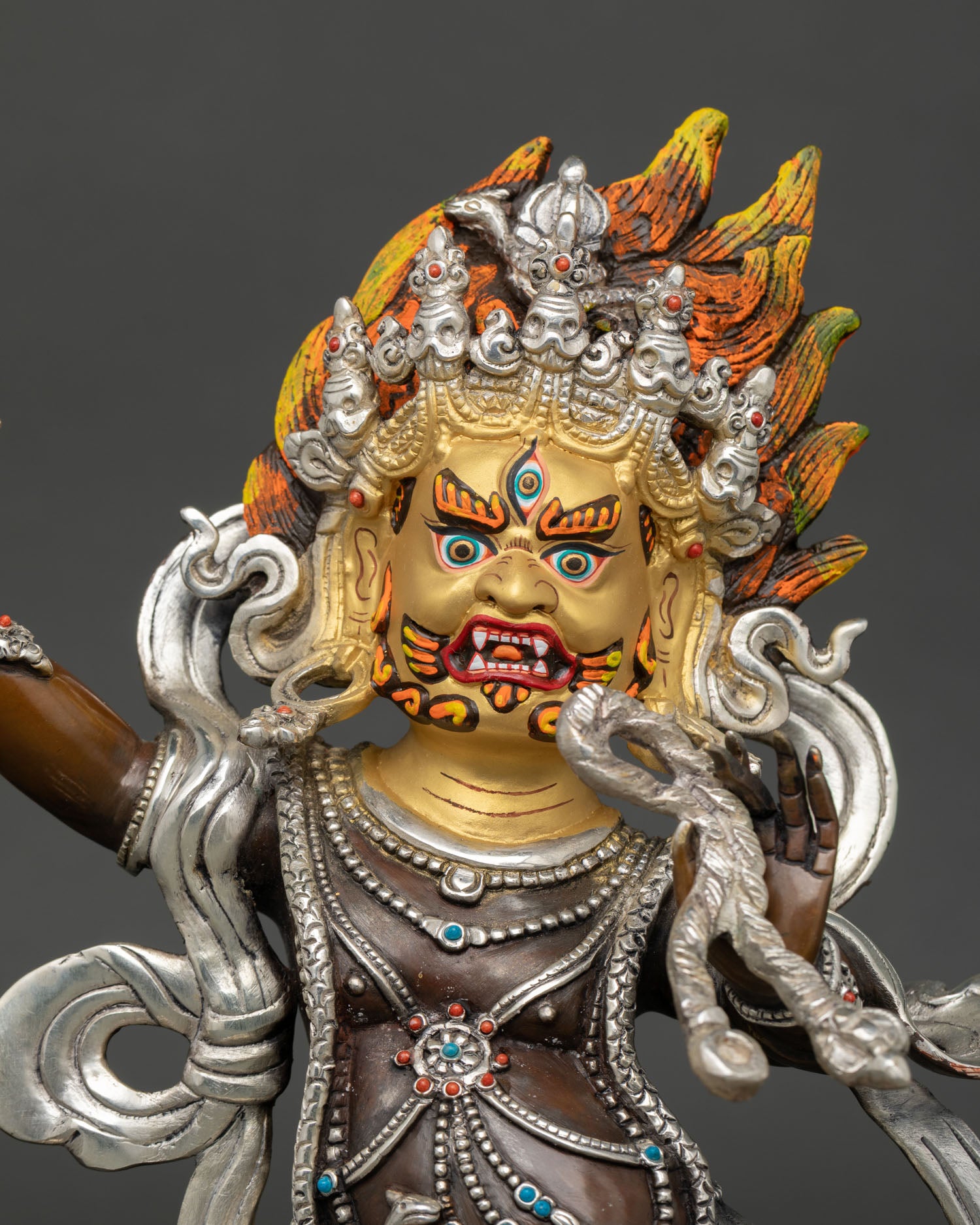 Close up Vajrapani fierce expression in dynamic posture representing protector of Buddhist teachings