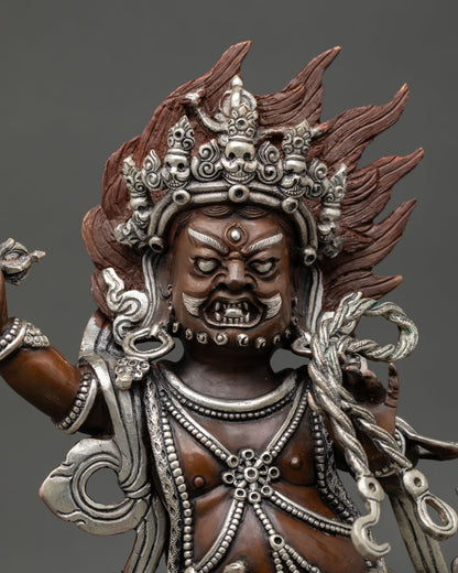 Close up Vajrapani statue fierce expression blazing flame halo intricate Himalayan craftsmanship oxidized copper silver accents Buddhist protector deity