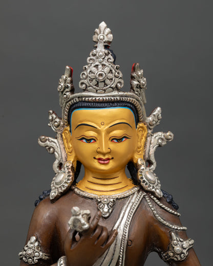 Close up Vajrasattva face serene expression 24K gold gilded finish Newari craftsmanship Himalayan Buddhist sacred art Nepal